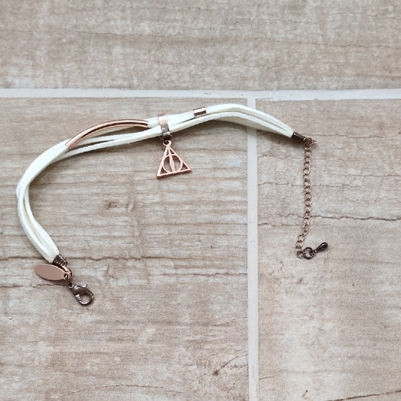 Other - Harry Potter Deadly Hollowes. White and Rose Gold Bracelet with Triangle Charm